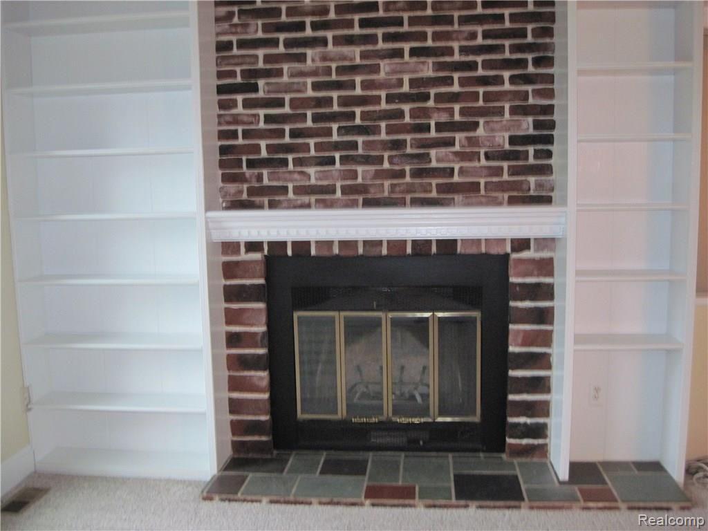 60 West Sutton Road Metamora, MI 48455 - Photo 21 of 39 Fireplace in Family Room