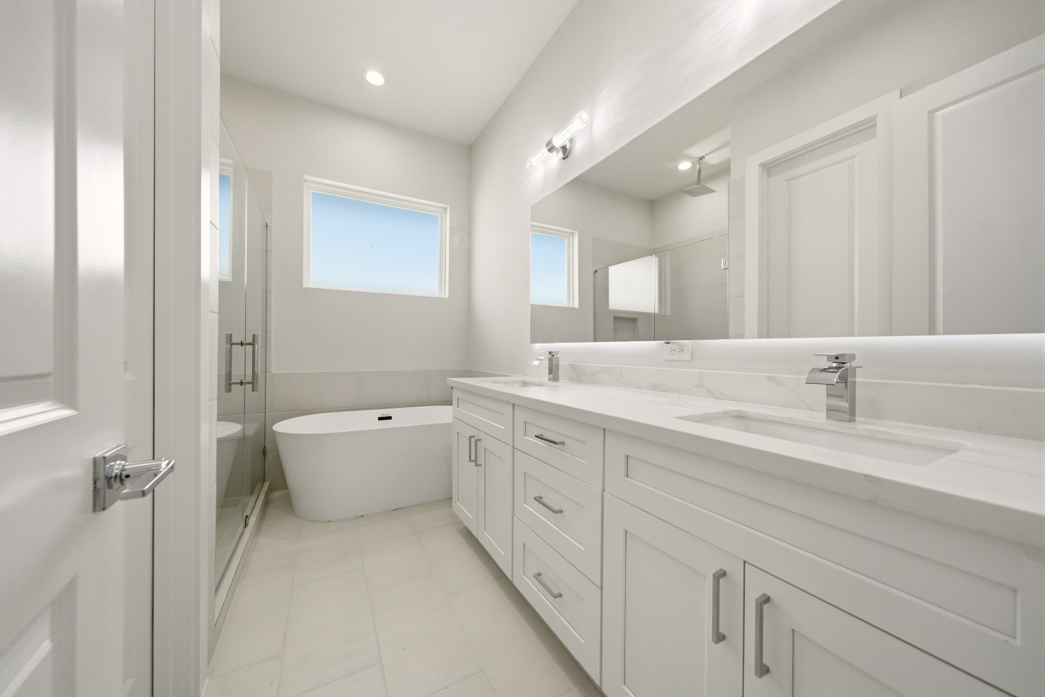 1398 Cedar Post Lane Houston, TX 77080 - Photo 22 of 33 a spacious bathroom with a double vanity sink mirror and toilet