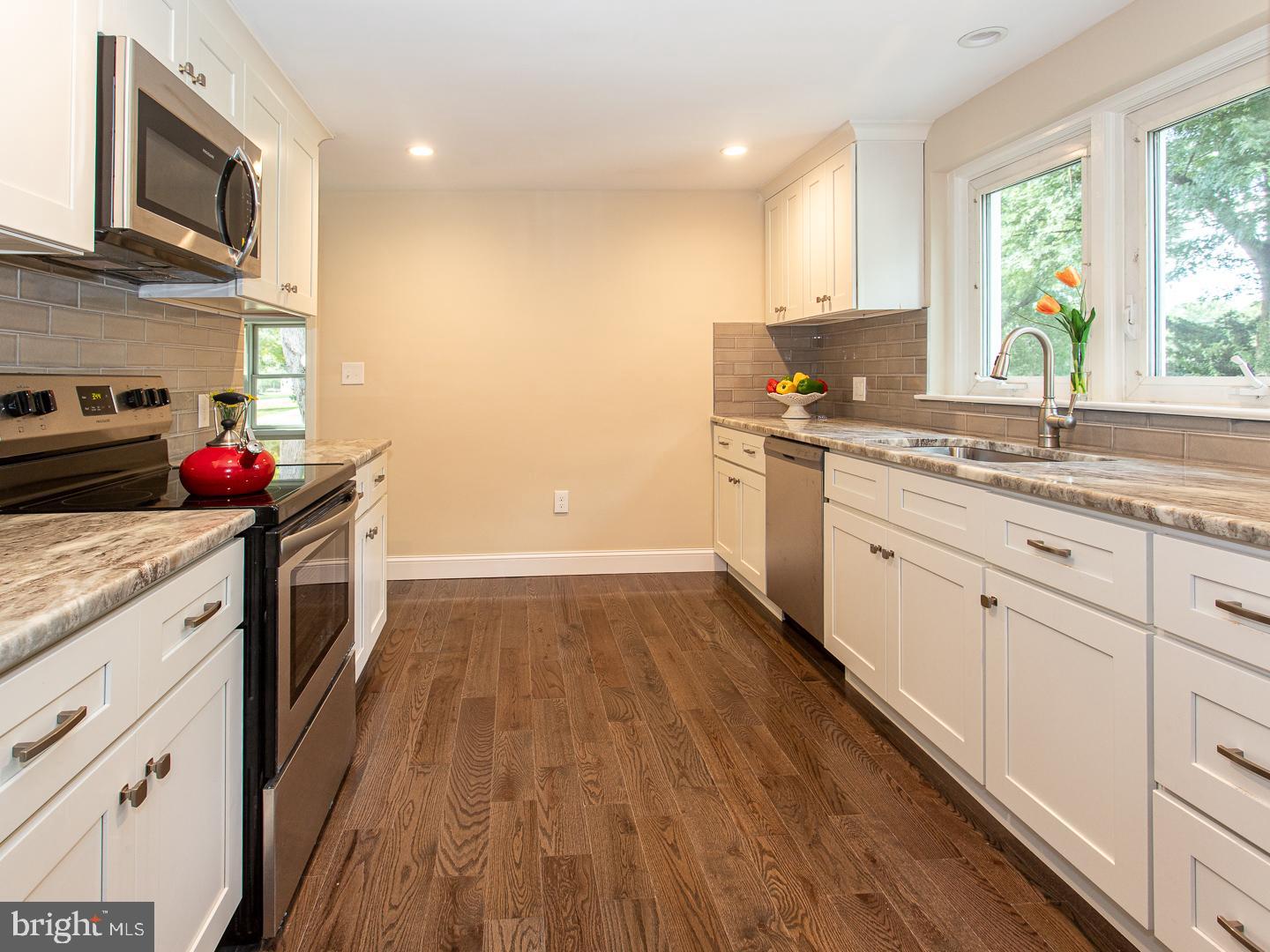 5 Owl Road Audubon, PA 19403 - Photo 5 of 32 Spacious Layout in this Updated Galley Kitchen