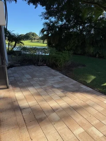 a view of swimming pool with a yard