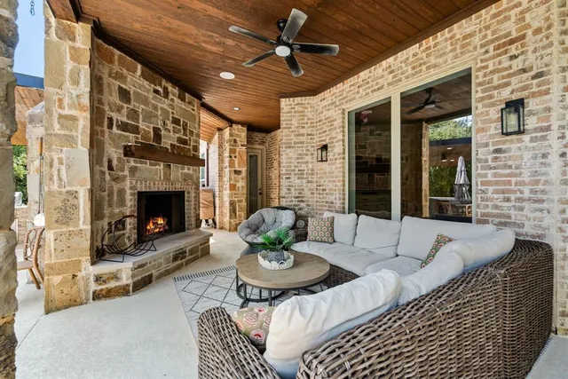 a view of a patio with couches table and chairs