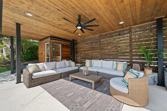 an outdoor view of house with backyard and garden