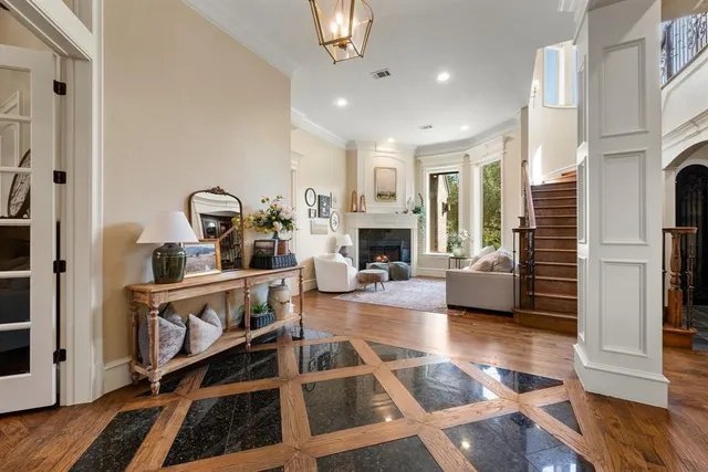 a living room with furniture stove and a fireplace