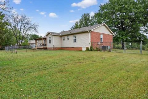 a house view with a outdoor space