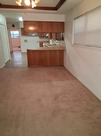 a kitchen with a stove and a microwave