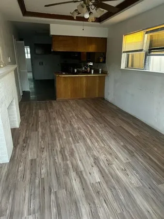 a kitchen with a stove and a microwave