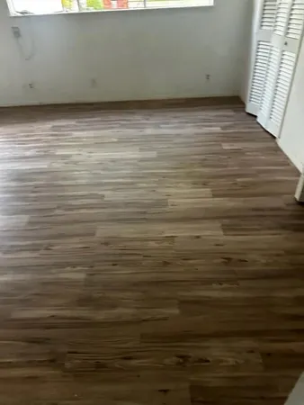 a stove top oven sitting inside of a kitchen