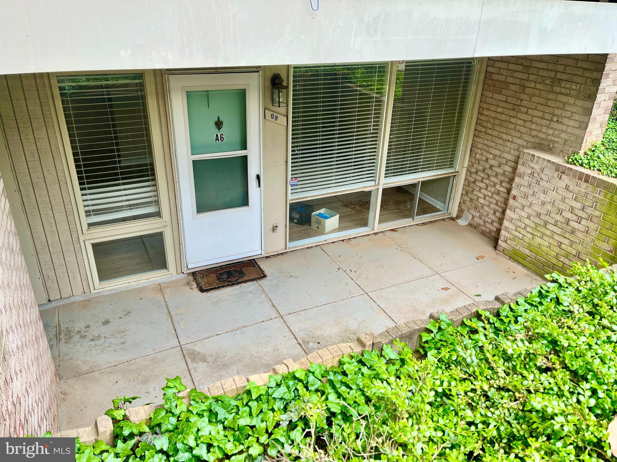 156 Haycock Road, Unit A6 Falls Church, VA 22046 - Photo 24 of 32 a view of a house with a porch