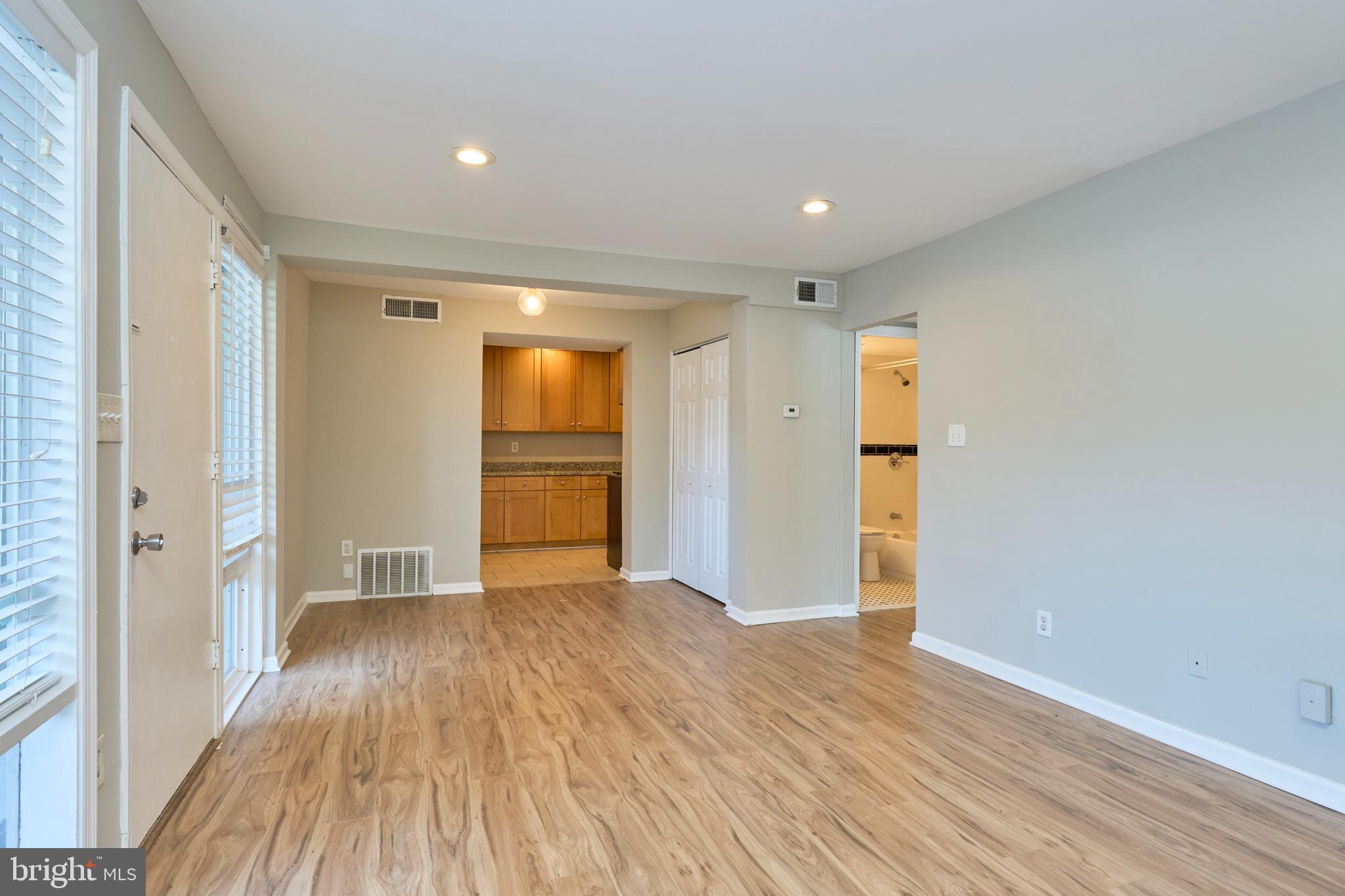 156 Haycock Road, Unit A6 Falls Church, VA 22046 - Photo 8 of 32 a view of empty room with wooden floor