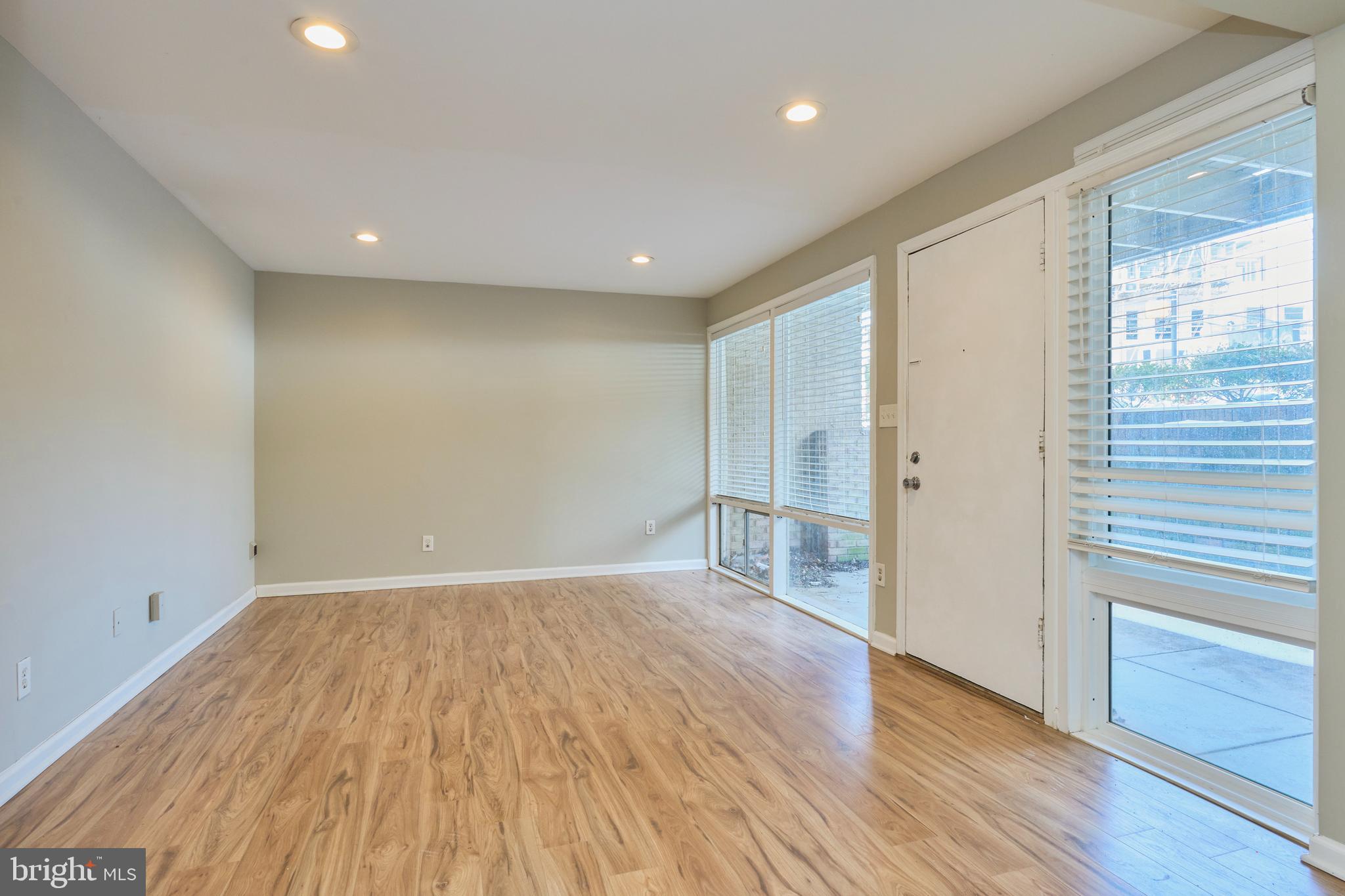 156 Haycock Road, Unit A6 Falls Church, VA 22046 - Photo 9 of 32 a view of empty room with wooden floor