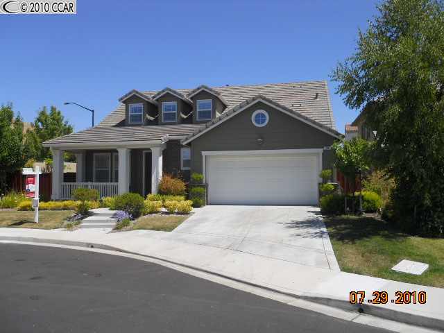 238 Cullens Court San Ramon, CA 94582 - Photo 1 of 1 a front view of a house with a yard and garage