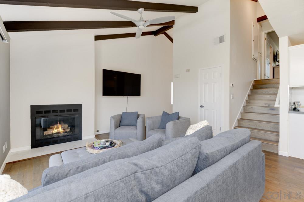 807 Highland Drive Solana Beach, CA 92075 - Photo 15 of 27 a living room with furniture and a fireplace