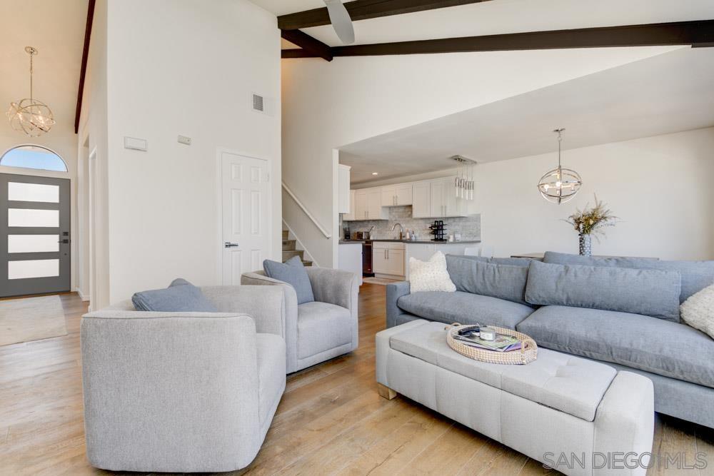 807 Highland Drive Solana Beach, CA 92075 - Photo 2 of 27 a living room with furniture and kitchen view