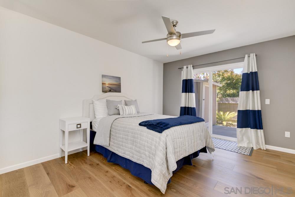 807 Highland Drive Solana Beach, CA 92075 - Photo 21 of 27 a bedroom with a bed and window