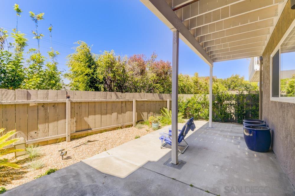807 Highland Drive Solana Beach, CA 92075 - Photo 25 of 27 a backyard of a house with table and chairs