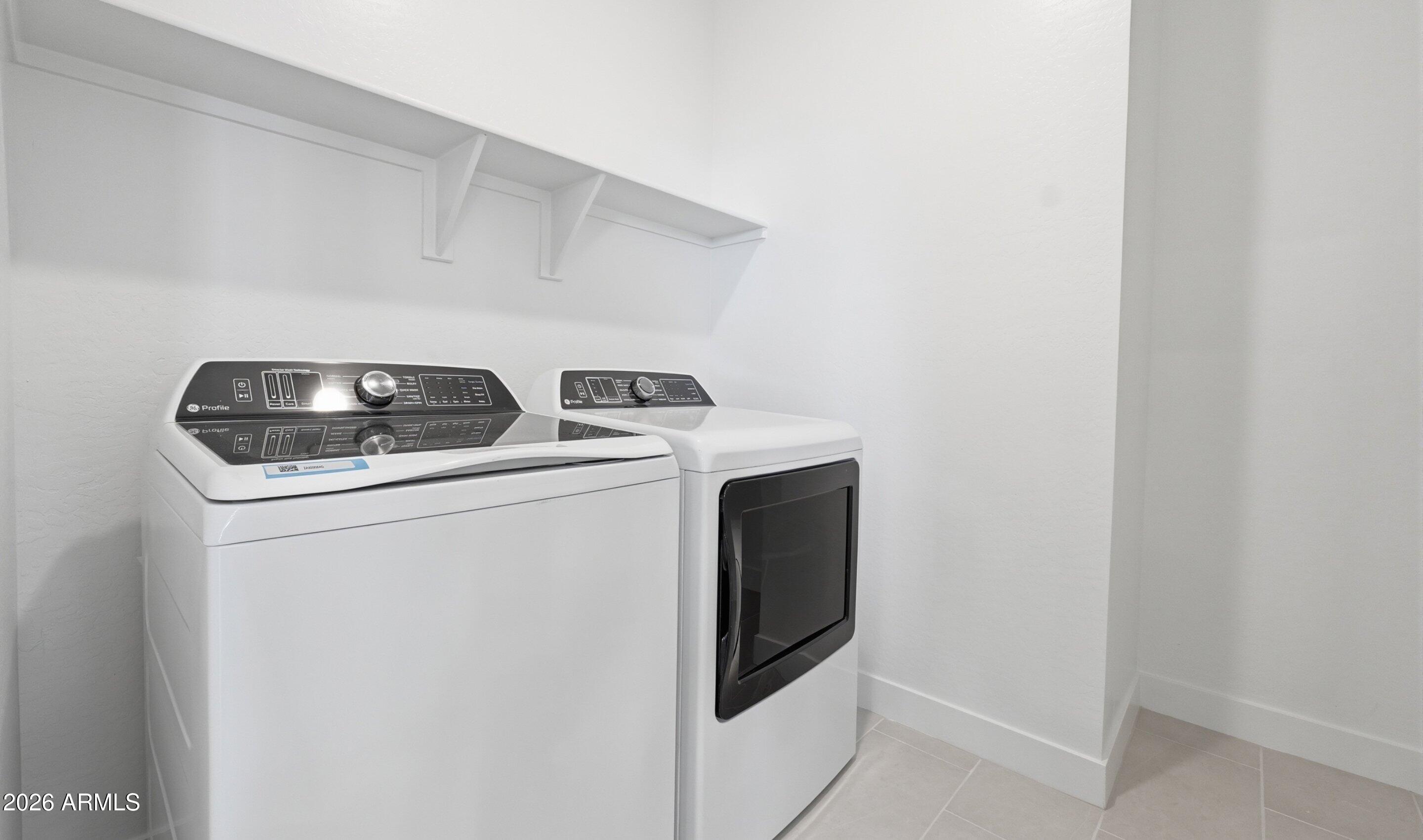 7779 West Sands Road Glendale, AZ 85303 - Photo 28 of 37 a utility room with dryer and washer