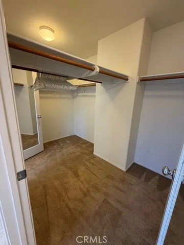 an empty room with a empty space and window