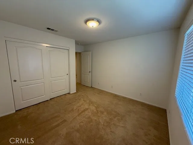 a bathroom with a toilet a sink and bathtub