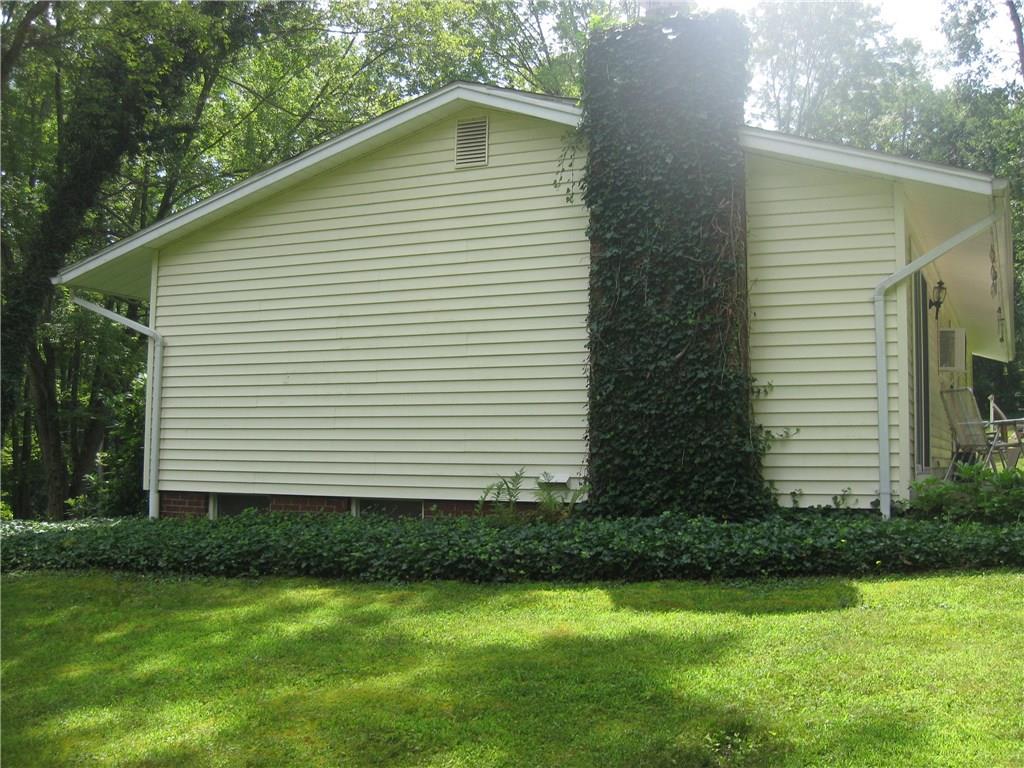 1068 Leesburg Station Road Volant, PA 16156 - Photo 3 of 25 Healthy ivy.... attractive brick!