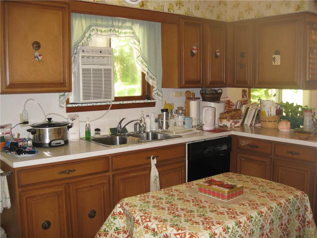 1068 Leesburg Station Road Volant, PA 16156 - Photo 10 of 25 Lots of countertop and storage space in kitchen!