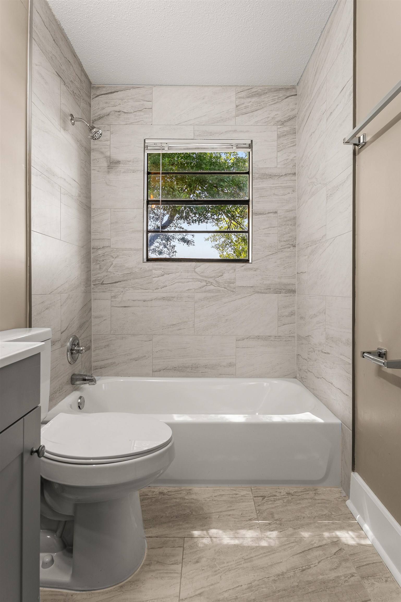 3759 McCain Road Memphis, TN 38109 - Photo 18 of 30 a bathroom with a toilet and a shower