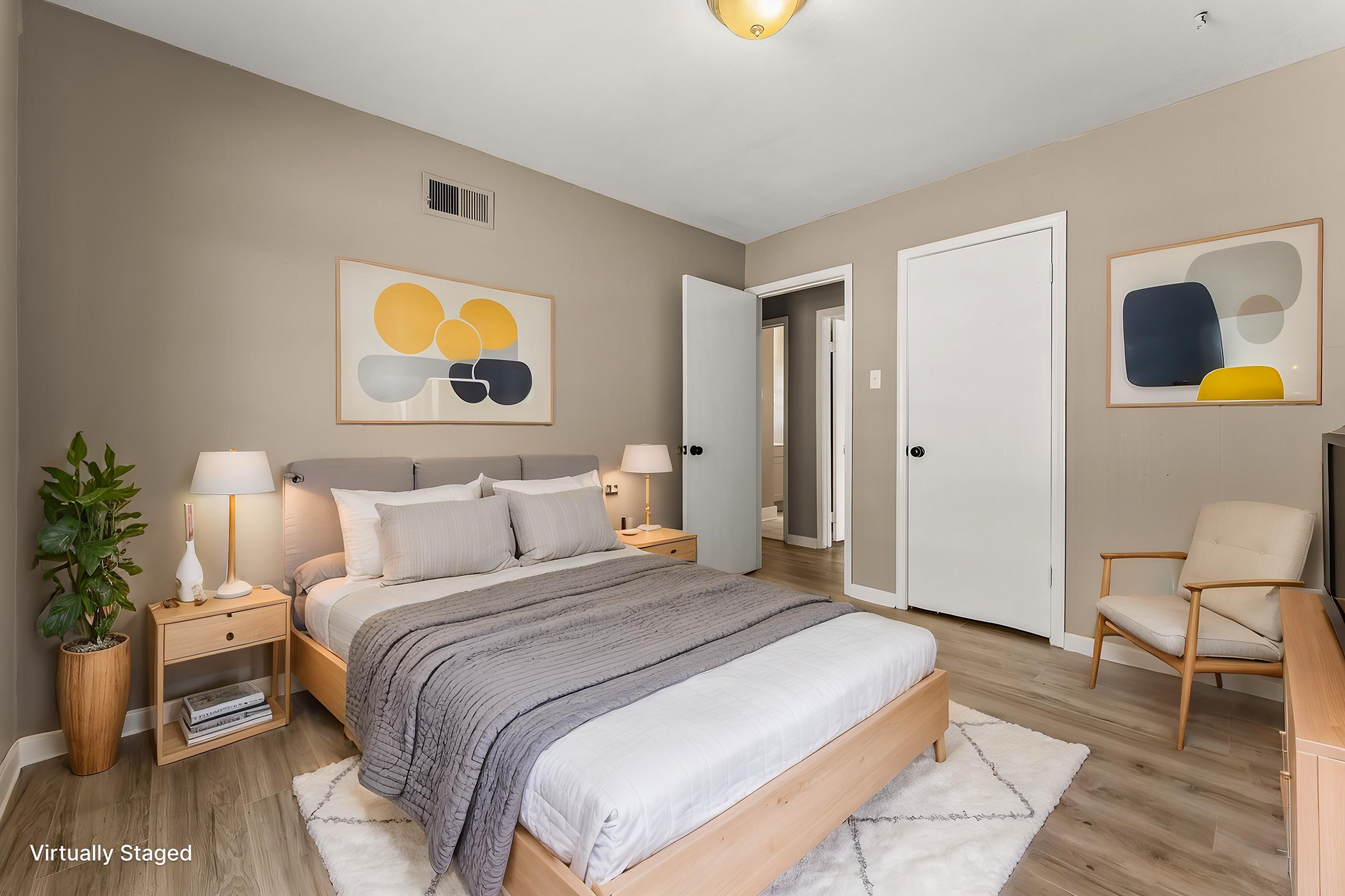 3759 McCain Road Memphis, TN 38109 - Photo 19 of 30 a bedroom with a bed and painting on the wall