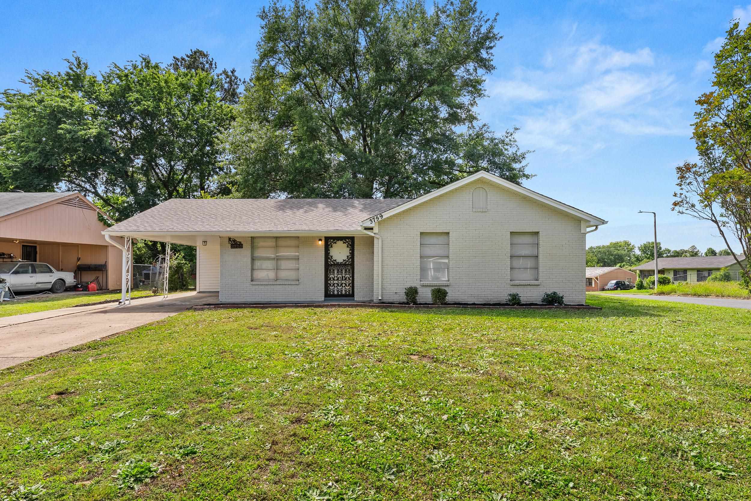 3759 McCain Road Memphis, TN 38109 - Photo 2 of 30 a view of a house with a yard