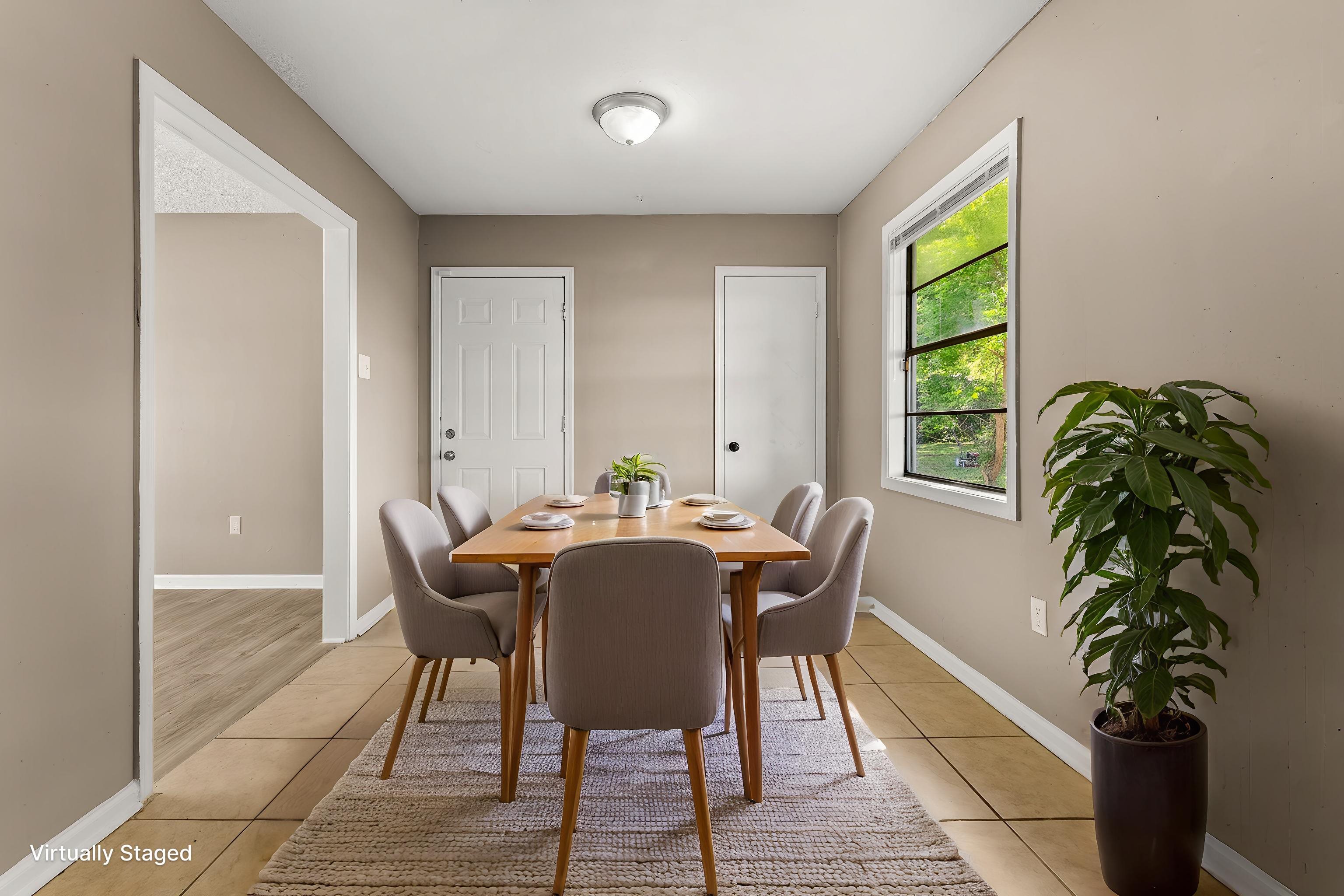 3759 McCain Road Memphis, TN 38109 - Photo 9 of 30 a view of a dining room with furniture window and outside view