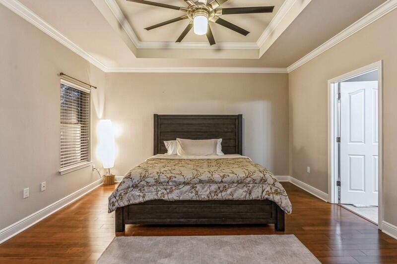 516 Pheasant Trail Crestview, FL 32536 - Photo 21 of 38 a bedroom with a bed and window