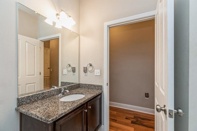 516 Pheasant Trail Crestview, FL 32536 - Photo 30 of 38 a bathroom with a granite countertop sink and a mirror