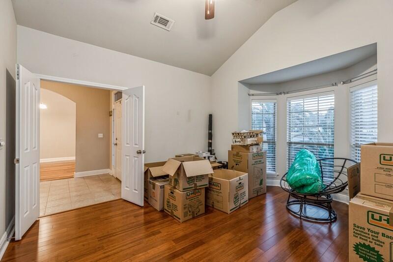 516 Pheasant Trail Crestview, FL 32536 - Photo 8 of 38 a living room with furniture and a wooden floor