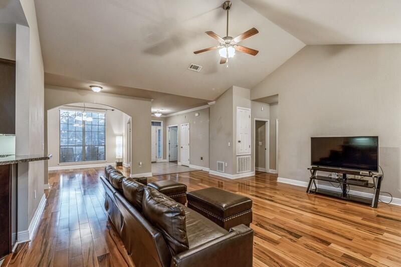 516 Pheasant Trail Crestview, FL 32536 - Photo 10 of 38 a living room with furniture and a flat screen tv