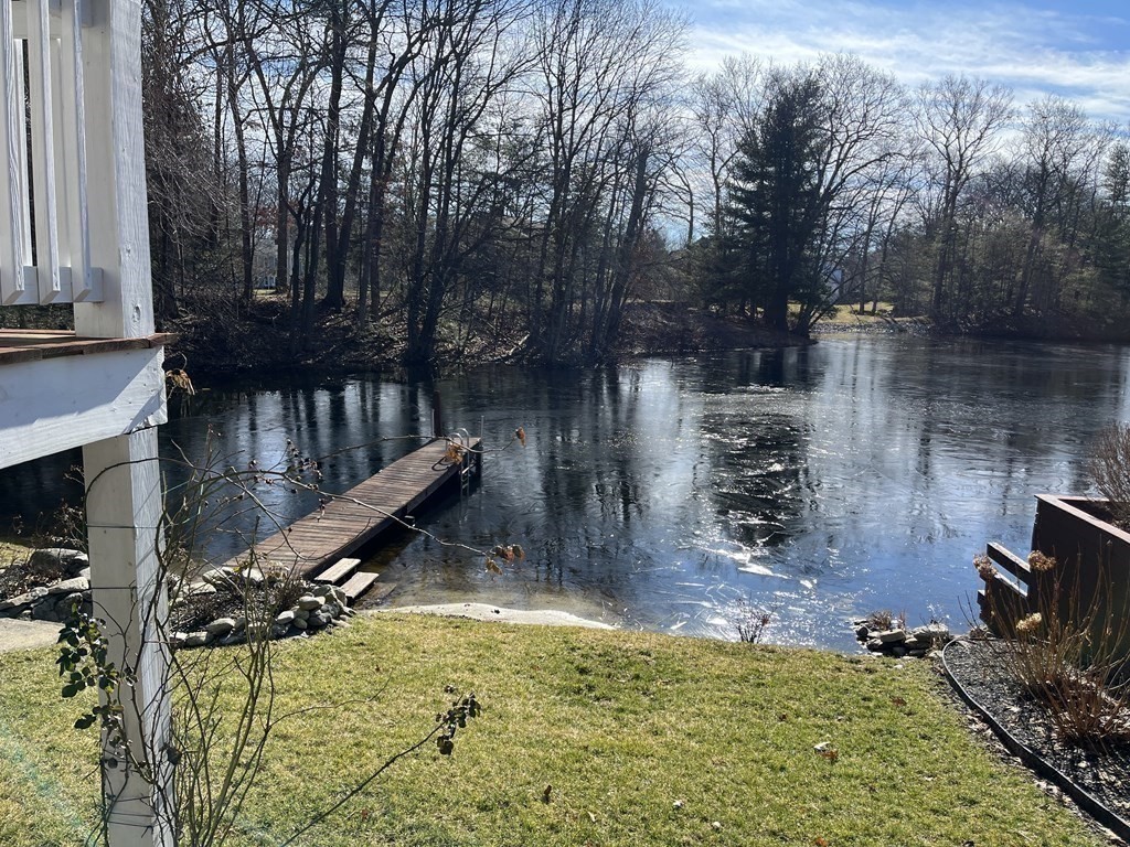 49 Hayden Pond Road, Unit 2 Dudley, MA 01571 - Photo 3 of 18 a view of a water fountain in the backyard