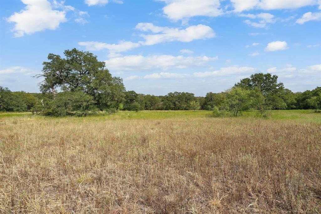 Lot 15 Double B Ranch Road South Perrin, TX 76486 - Photo 14 of 19 a view of a lake with houses in the back