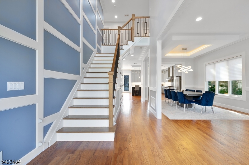 57 Walnut Street Livingston, NJ 07039 - Photo 2 of 43 a view of entryway dining room and hall with wooden floor