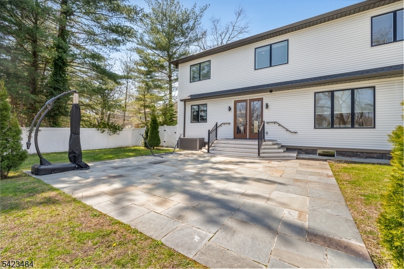 57 Walnut Street Livingston, NJ 07039 - Photo 41 of 43 a view of a house with basketball court