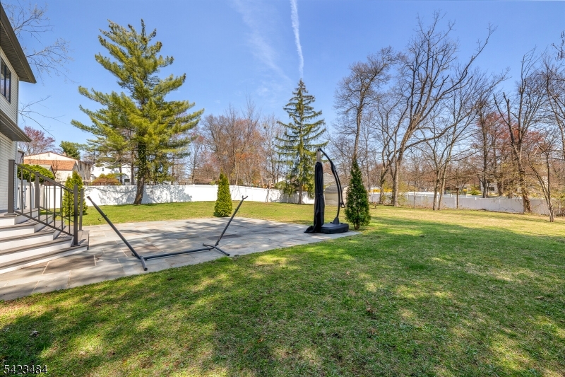 57 Walnut Street Livingston, NJ 07039 - Photo 42 of 43 a view of a playground with basketball court