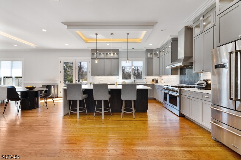 57 Walnut Street Livingston, NJ 07039 - Photo 8 of 43 a open kitchen with lots of counter top space and stainless steel appliances