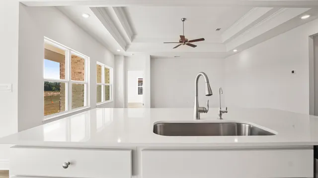 a view of an empty walk in closet with empty racks