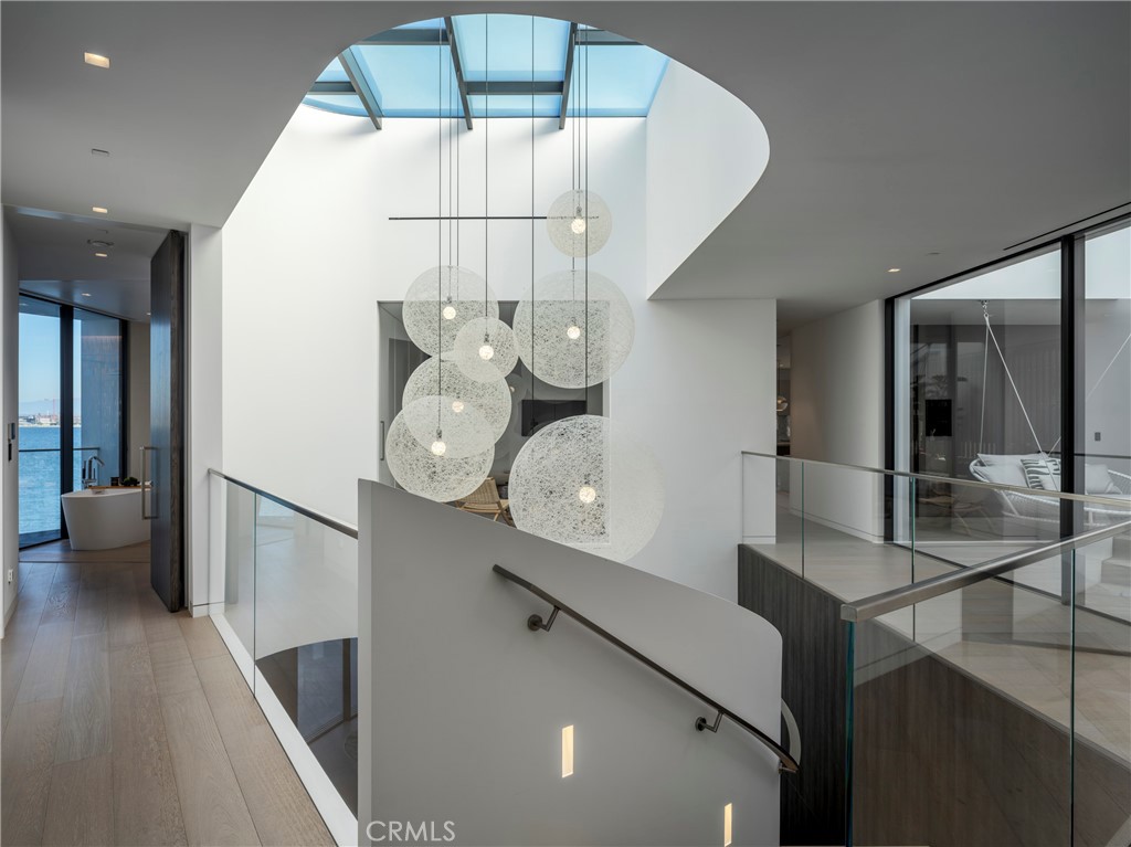 3 The Point Coronado, CA 92118 - Photo 19 of 53 a very nice looking room with wooden floor