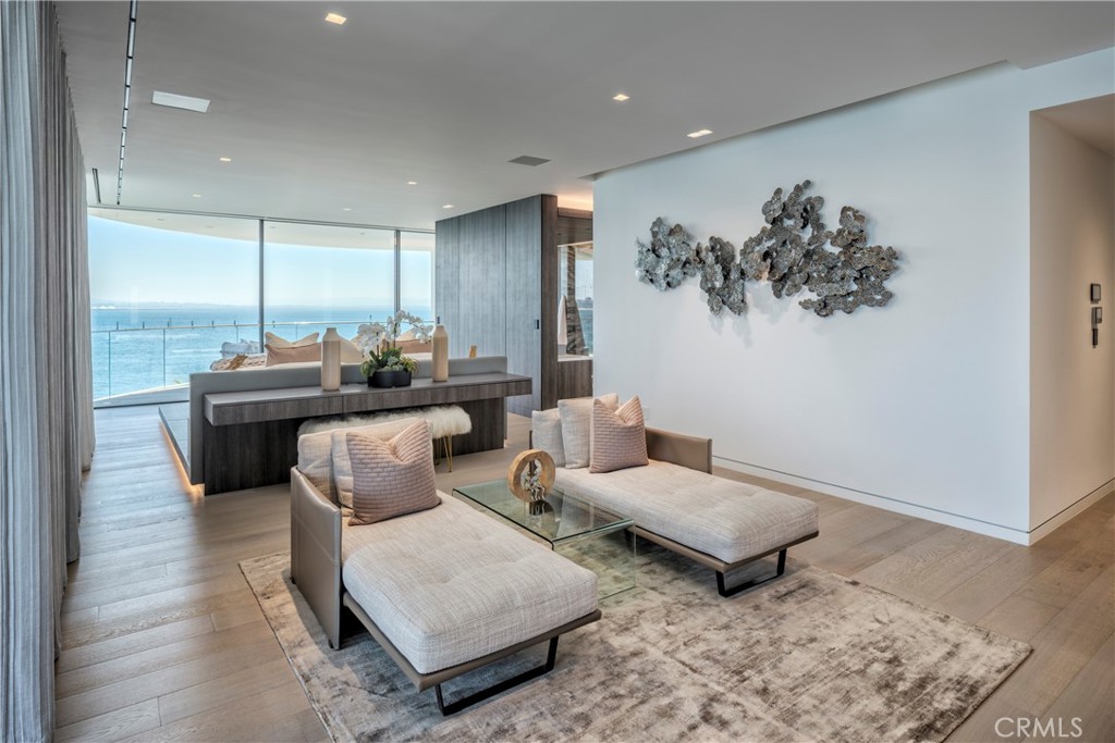 3 The Point Coronado, CA 92118 - Photo 22 of 53 a living room with furniture and wooden floor