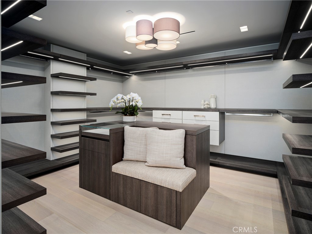 3 The Point Coronado, CA 92118 - Photo 28 of 53 a living room with stainless steel appliances kitchen island furniture and a chandelier