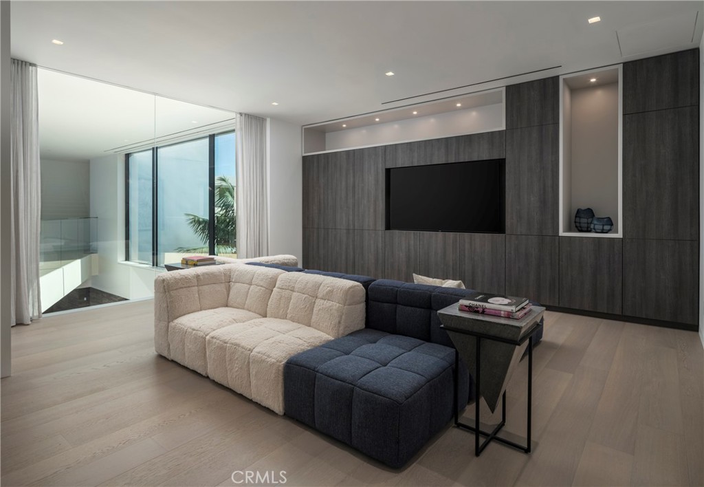 3 The Point Coronado, CA 92118 - Photo 29 of 53 a living room with furniture and a flat screen tv