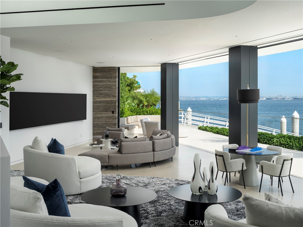 3 The Point Coronado, CA 92118 - Photo 40 of 53 a living room with furniture and a large window