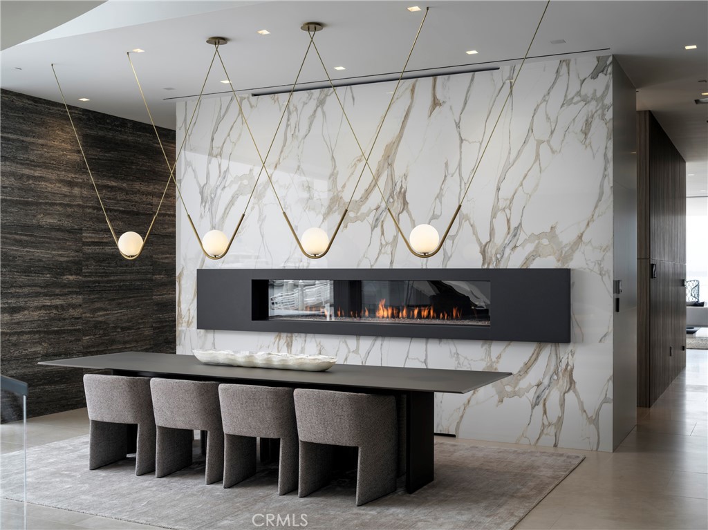 3 The Point Coronado, CA 92118 - Photo 10 of 53 a kitchen with a table and chairs in it