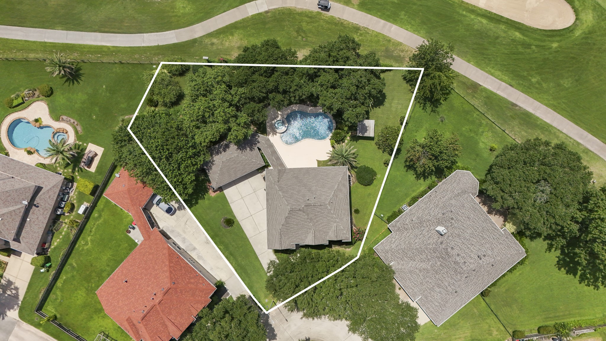 5807 Sequoia Trace Court Spring, TX 77379 - Photo 37 of 50 This oversized cul-de-sac lot backs directly to the Windrose Golf course, giving the backyard a true resort-style feel with a private pool, spa, shaded deck space, and room to unwind after a day on the course or around the neighborhood.
