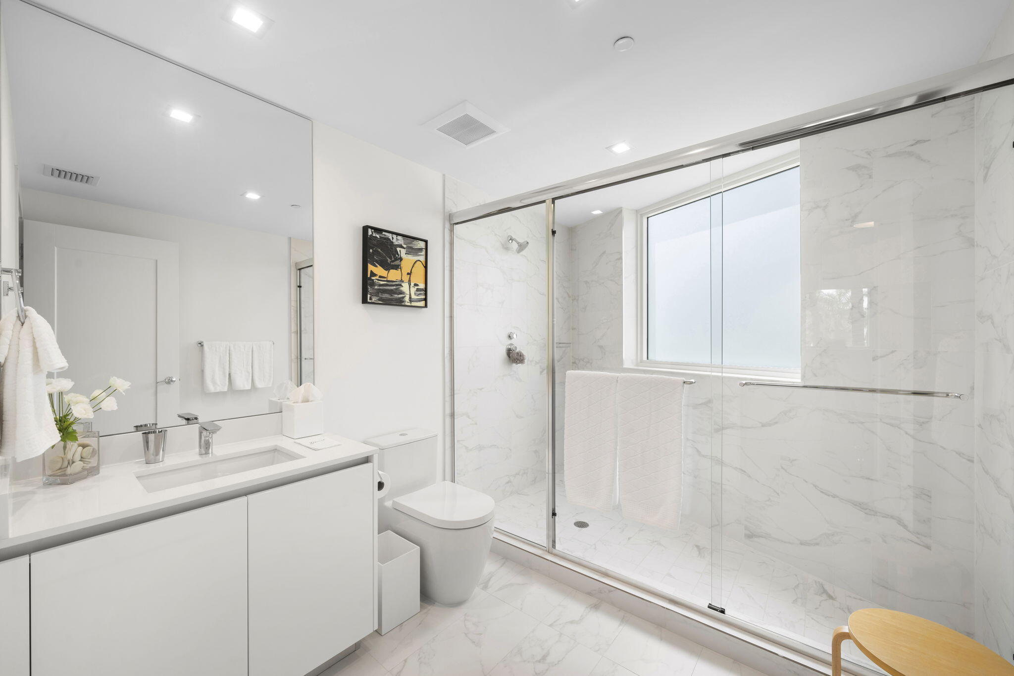 20155 Boca W Drive, Unit C201 Boca Raton, FL 33434 - Photo 17 of 42 a bathroom with a granite countertop sink toilet and shower