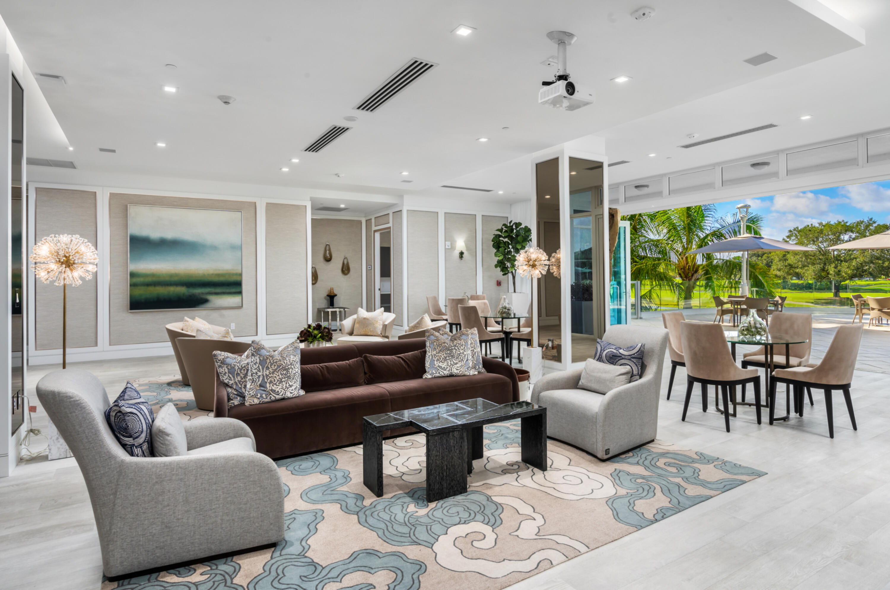 20155 Boca W Drive, Unit C201 Boca Raton, FL 33434 - Photo 30 of 42 a living room with furniture and a large window