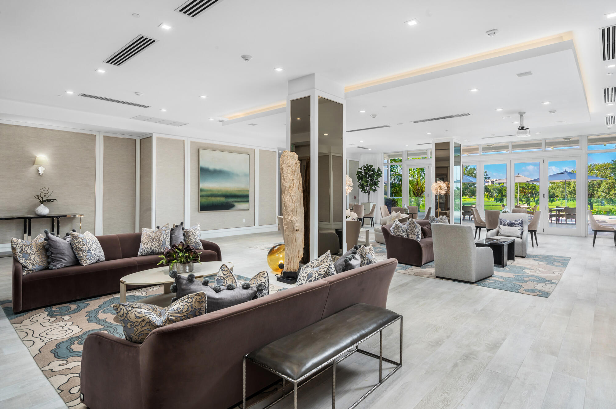 20155 Boca W Drive, Unit C201 Boca Raton, FL 33434 - Photo 31 of 42 a living room with furniture and a large window