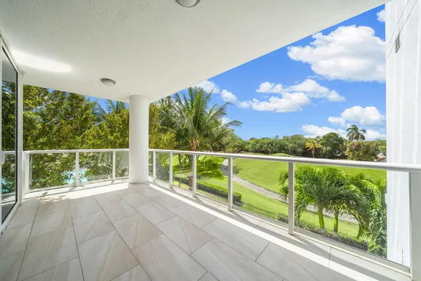 a view of balcony with furniture